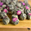 HERBATA KWITNĄCA BIAŁA I ZIELONA FLOWER LICHI BALL - CYTRYNA CYTRYNOWA 1szt HERBATA KWITNĄCA BIAŁA I ZIELONA FLOWER LICHI BALL - CYTRYNA CYTRYNOWA 1szt